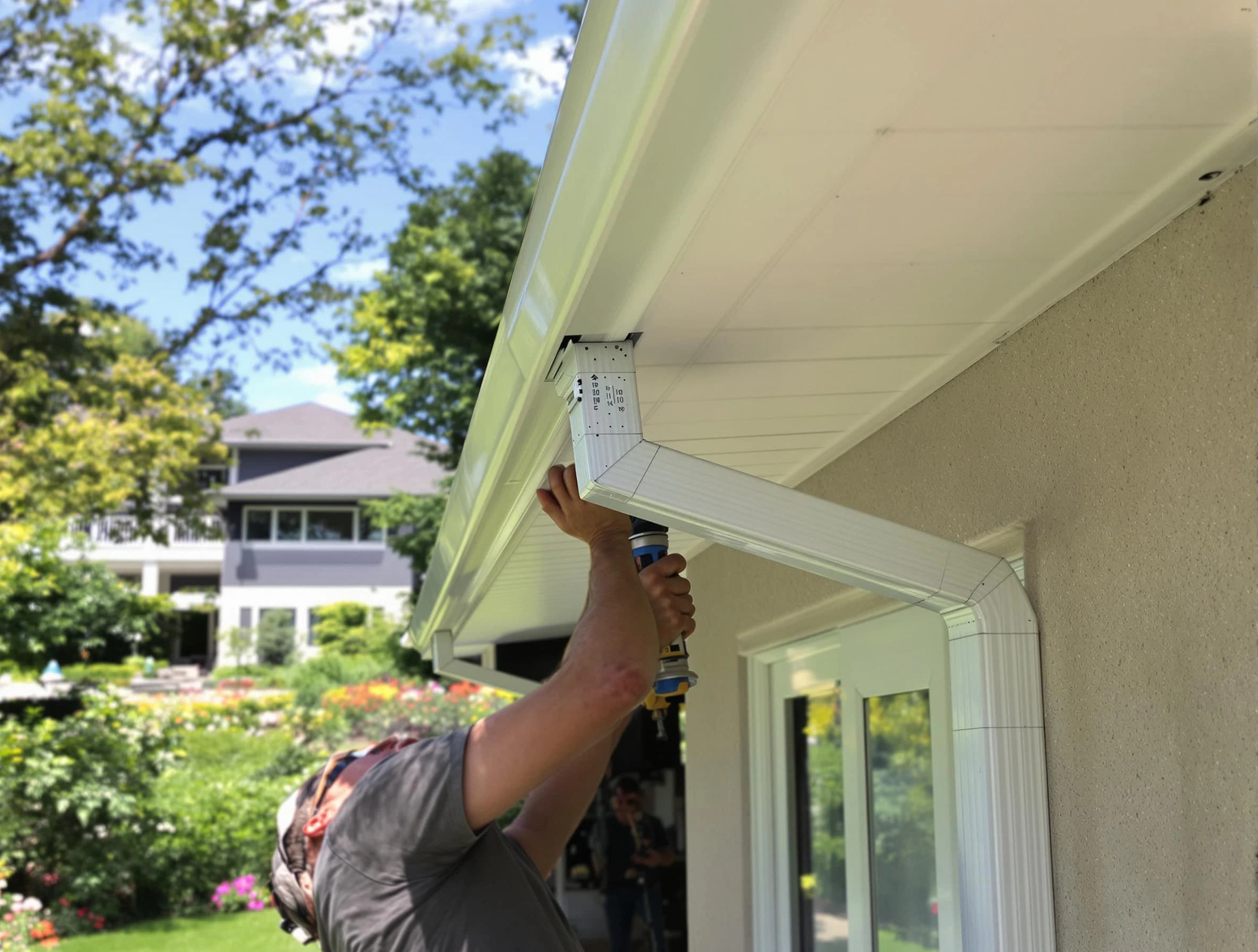 Tallmadge Roofing Company technicians performing gutter installation in Tallmadge, OH